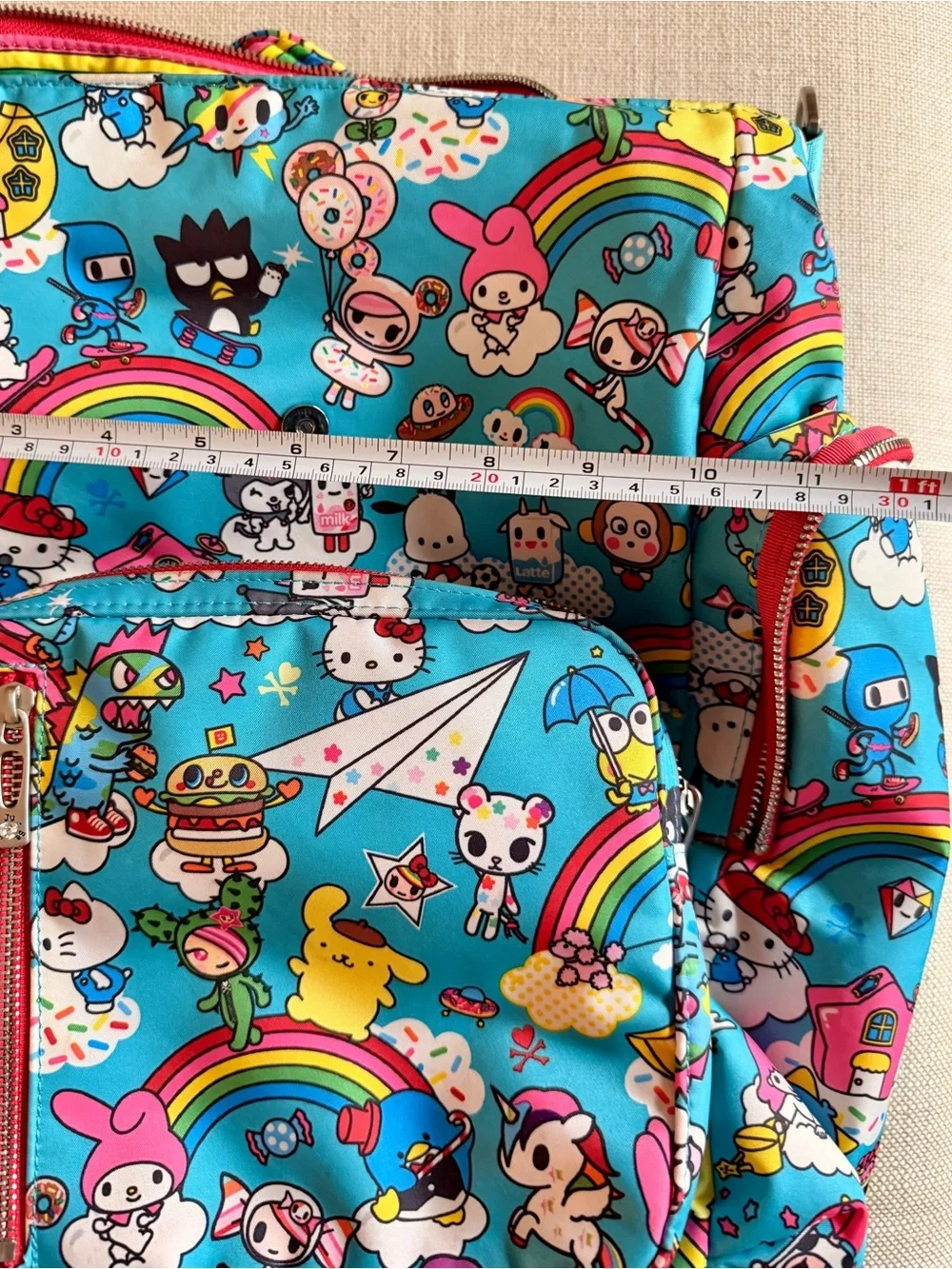 tokidoki x Hello Sanrio for JujuBe Baby Backpack - Bright Blue Rainbow Print